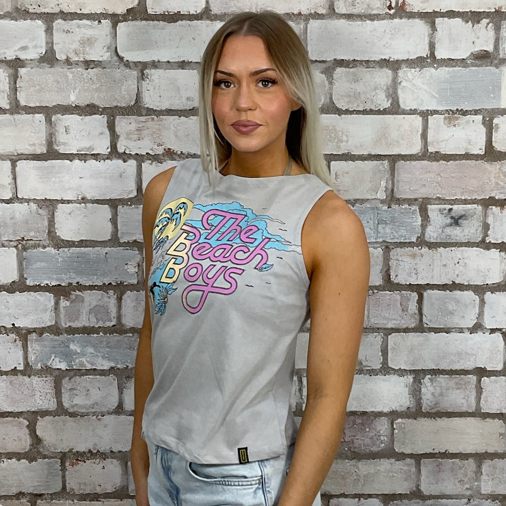 The Beach Boys graphic tshirt recycled into sleeveless vest top, sustainable upcycled fashion, British recycled fashion brand, slow fashion, eco conscious band graphic tshirt upcycled by Unwantees, recycled tshirt otherwise destined for landfill.  Rock music style graphic tshirt upcycled by Unwantees, Slash Neck tank top, upcycled in the UK by unwantees. Sustainable upcycled fashion