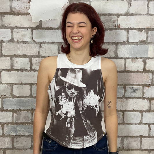 Johnny Depp Graphic print on 100% white cotton fabric, Festival Style Unwantee made from upcycled and deconstructed graphic tshirt, punk rock style street wear, athleisure wear, unwantees is a sustainable fashion brand, we take unwanted graphic tshirts otherwise destined for landfill and recycle clothing into vest tops for sports wear or leisure.  Refashioned band merch, Slash Neck Sleeveless Top