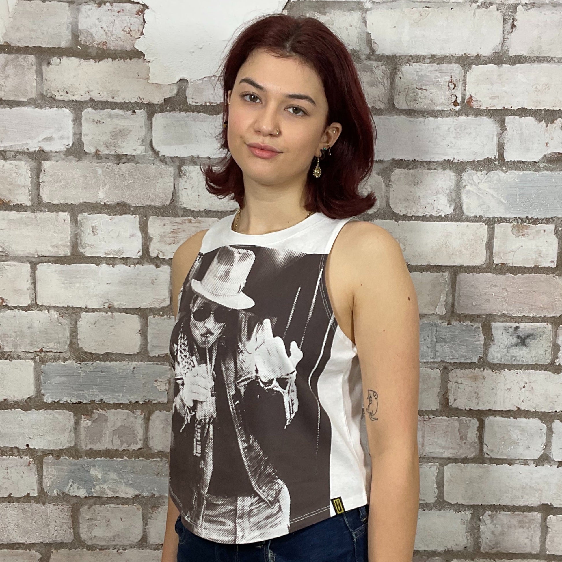 The cool sex icon Johnny Depp Graphic print on 100% white cotton fabric, Festival Style Unwantee made from upcycled and deconstructed graphic tshirt, punk rock style street wear, athleisure wear, unwantees is a sustainable fashion brand, we take unwanted graphic tshirts otherwise destined for landfill and recycle clothing into vest tops for sports wear or leisure.  Refashioned band merch, Slash Neck Sleeveless Top