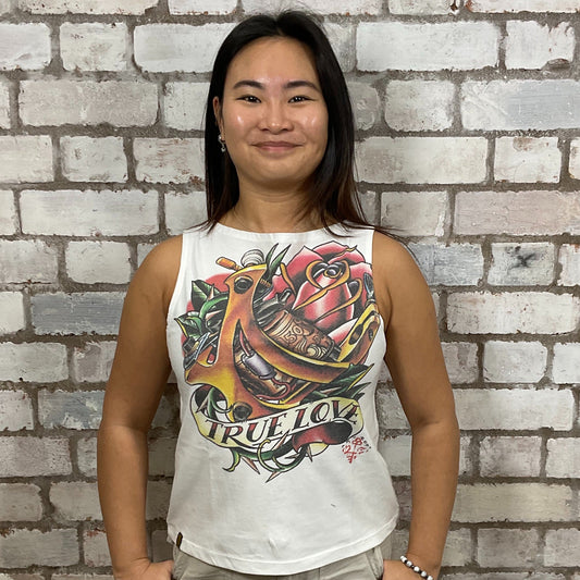 True love Tattoo Graphic print on 100% white cotton fabric, Festival Style Unwantee made from upcycled and deconstructed graphic tshirt, punk rock style street wear, athleisure wear, unwantees is a sustainable fashion brand, we take unwanted graphic tshirts otherwise destined for landfill and recycle clothing into vest tops for sports wear or leisure.  Refashioned band merch, Slash Neck Sleeveless Top