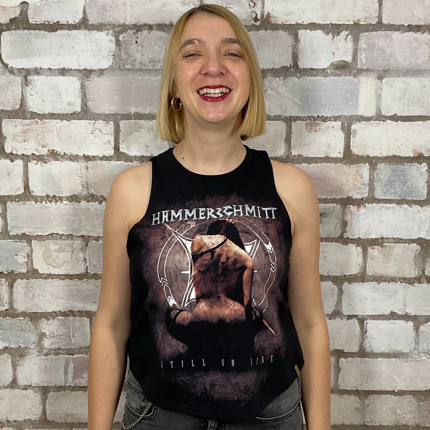 Still on Fire Tour Tshirt from Hammerschmitt 2016, graphic on black T-shirt, top made from upcycled graphic band tshirt, punk rock style street wear, athleisure wear, unwantees is a sustainable fashion brand, we take unwanted graphic tshirts otherwise destined for landfill and recycle clothing into vest tops for sports wear or leisure.  Refashioned band merch, Slash Neck Sleeveless Top