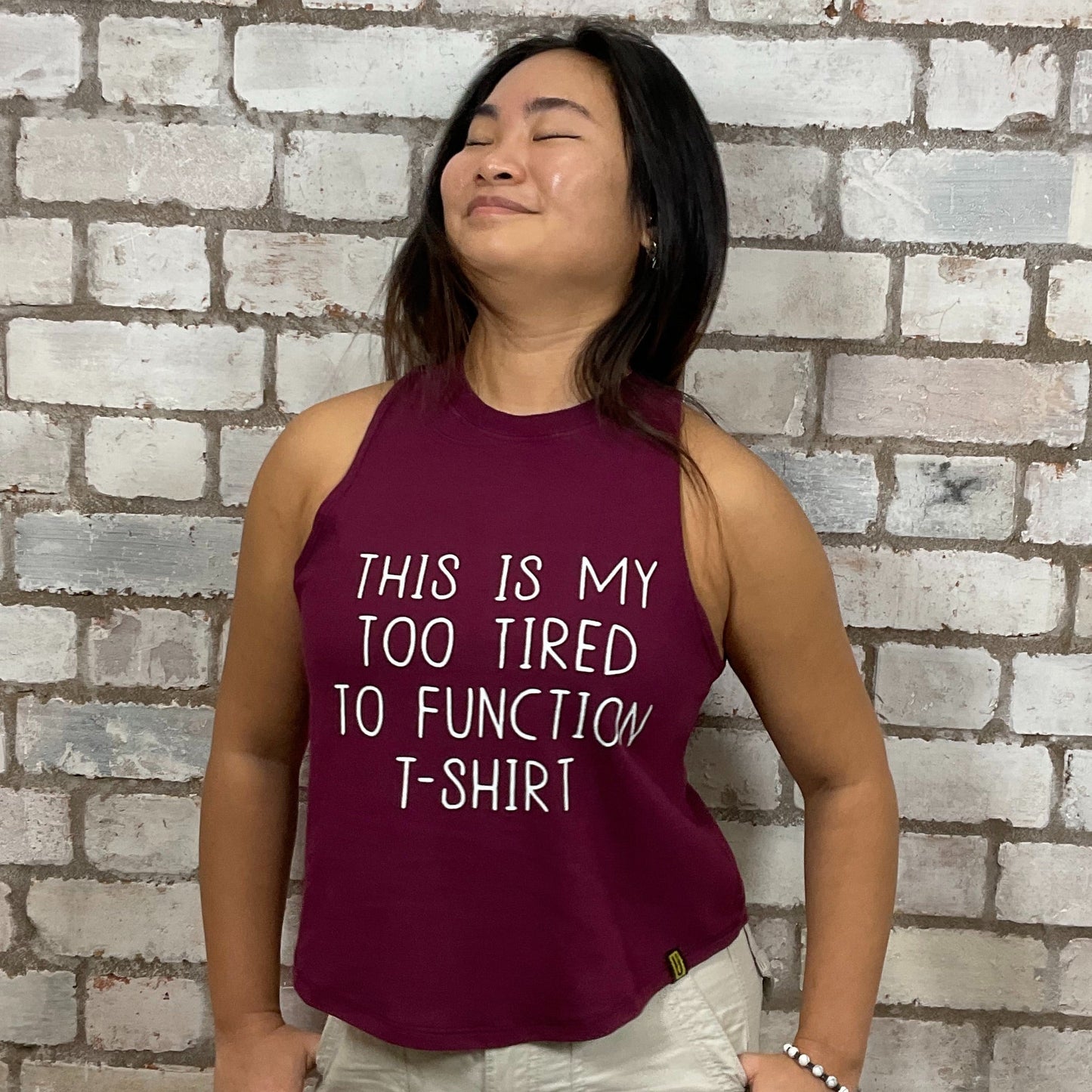 Too Tired to Function Graphic Tshirt, tank top made from upcycled graphic band tshirt, punk rock style street wear, athleisure wear, unwantees is a sustainable fashion brand, we take unwanted graphic tshirts otherwise destined for landfill and recycle clothing into vest tops for sports wear or leisure.  Refashioned band merch, Slash Neck Sleeveless Top