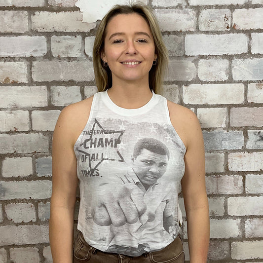 Mo Ali merch tshirt, The Greatest graphic print Tshirt Upcycled by Unwantees, Graphic print on white Tshirt jersey fabric, Festival Style Unwantee made from upcycled and deconstructed graphic tshirt, athleisure wear, unwantees is a sustainable fashion brand, we take unwanted graphic tshirts otherwise destined for landfill and recycle clothing into vest tops for sports wear or leisure.  Refashioned band merch, Slash Neck Sleeveless Top