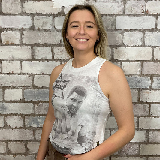 Mo Ali merch tshirt, Mohammed Ali, The Greatest of all time, boxing graphic print Tshirt Upcycled by Unwantees, Graphic print on white Tshirt jersey fabric, Festival Style Unwantee made from upcycled and deconstructed graphic tshirt, athleisure wear, unwantees is a sustainable fashion brand, we take unwanted graphic tshirts otherwise destined for landfill and recycle clothing into vest tops for sports wear or leisure.  Refashioned band merch, Slash Neck Sleeveless Top
