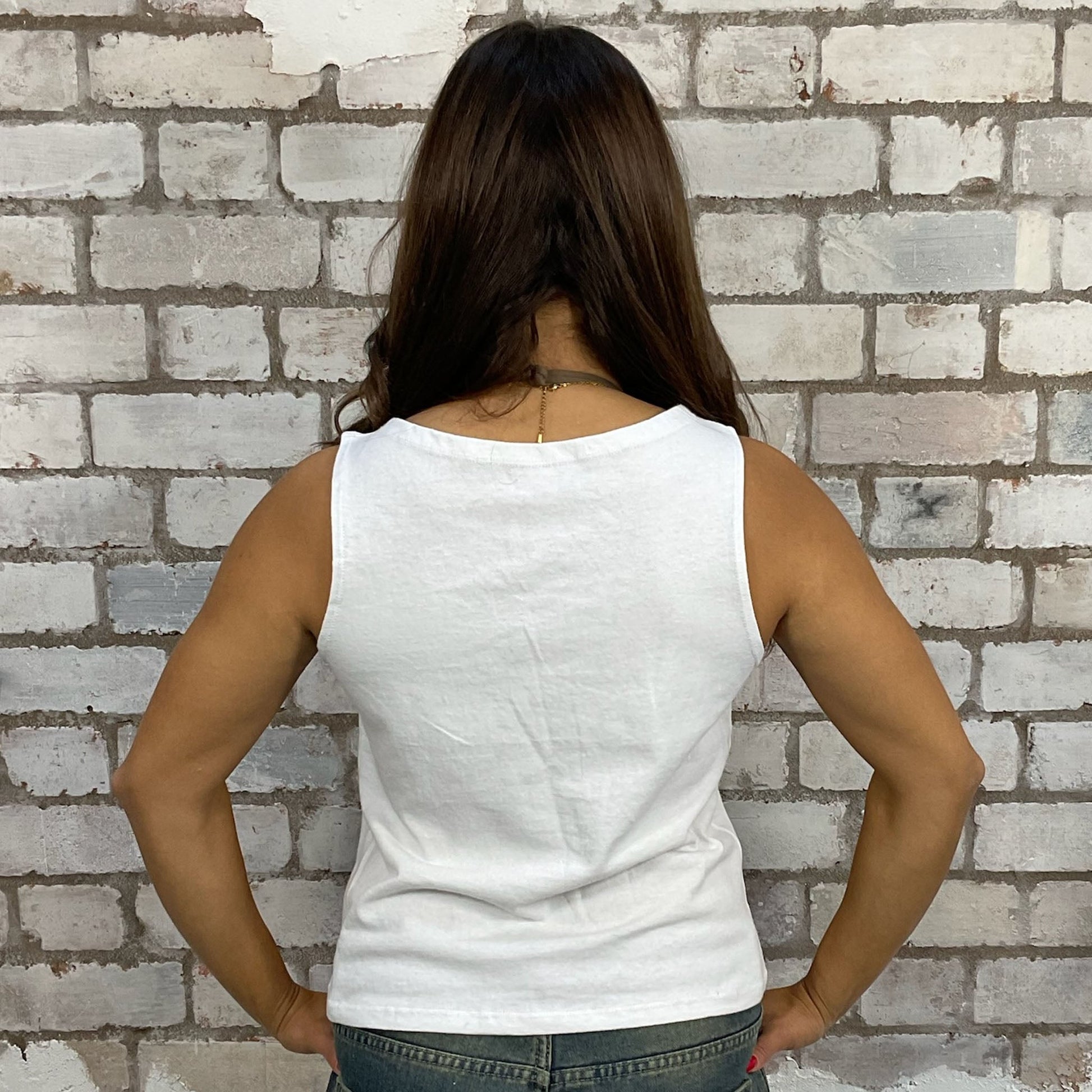 slash neck Nirvana print white tank top made from an upcycled graphic band tshirt, punk rock style street wear, athleisure wear, unwantees is a sustainable fashion brand, we take unwanted Y2K graphic tshirts otherwise destined for landfill and recycle clothing into vest tops for sports wear or leisure.  Refashioned band merch, Sleeveless Top