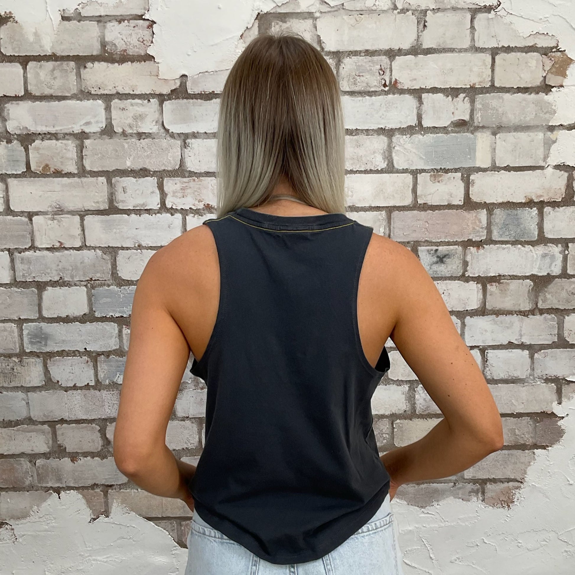 The godfather racerback tank top made from an upcycled graphic official paramount movie tshirt, punk rock style street wear, athleisure wear, unwantees is a sustainable fashion brand, we take unwanted Y2K graphic tshirts otherwise destined for landfill and recycle clothing into vest tops for sports wear or leisure.  Refashioned band merch, Sleeveless Top