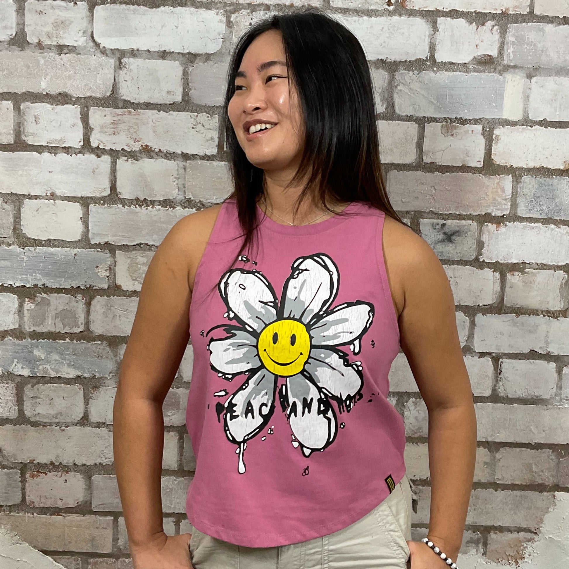 Happy Peace Flower Graphic Dusty Pink Tshirt, tank top made from upcycled graphic band tshirt, punk rock style street wear, athleisure wear, unwantees is a sustainable fashion brand, we take unwanted graphic tshirts otherwise destined for landfill and recycle clothing into vest tops for sports wear or leisure.  Refashioned band merch, Slash Neck Sleeveless Top