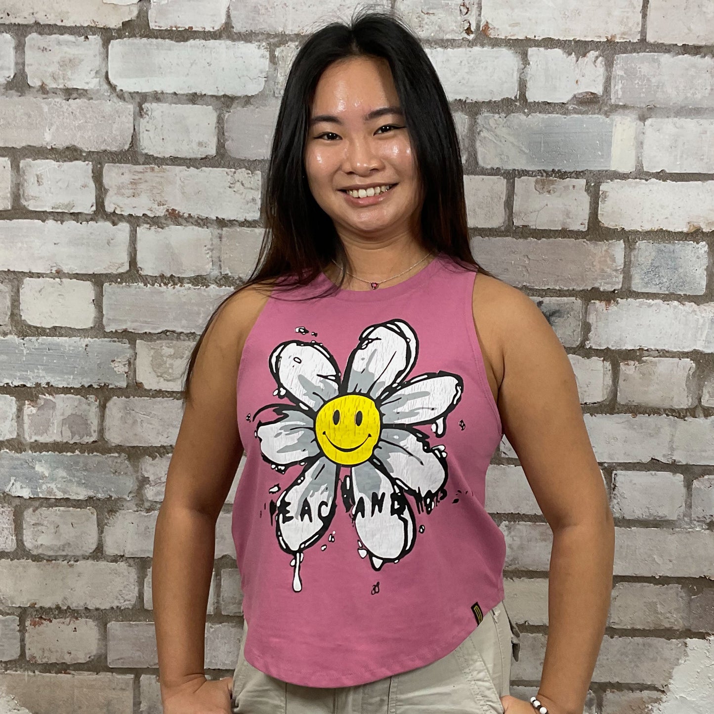 Peace Flower, Happy Graphic Dusty Pink Tshirt, tank top made from upcycled graphic band tshirt, punk rock style street wear, athleisure wear, unwantees is a sustainable fashion brand, we take unwanted graphic tshirts otherwise destined for landfill and recycle clothing into vest tops for sports wear or leisure.  Refashioned band merch, Slash Neck Sleeveless Top