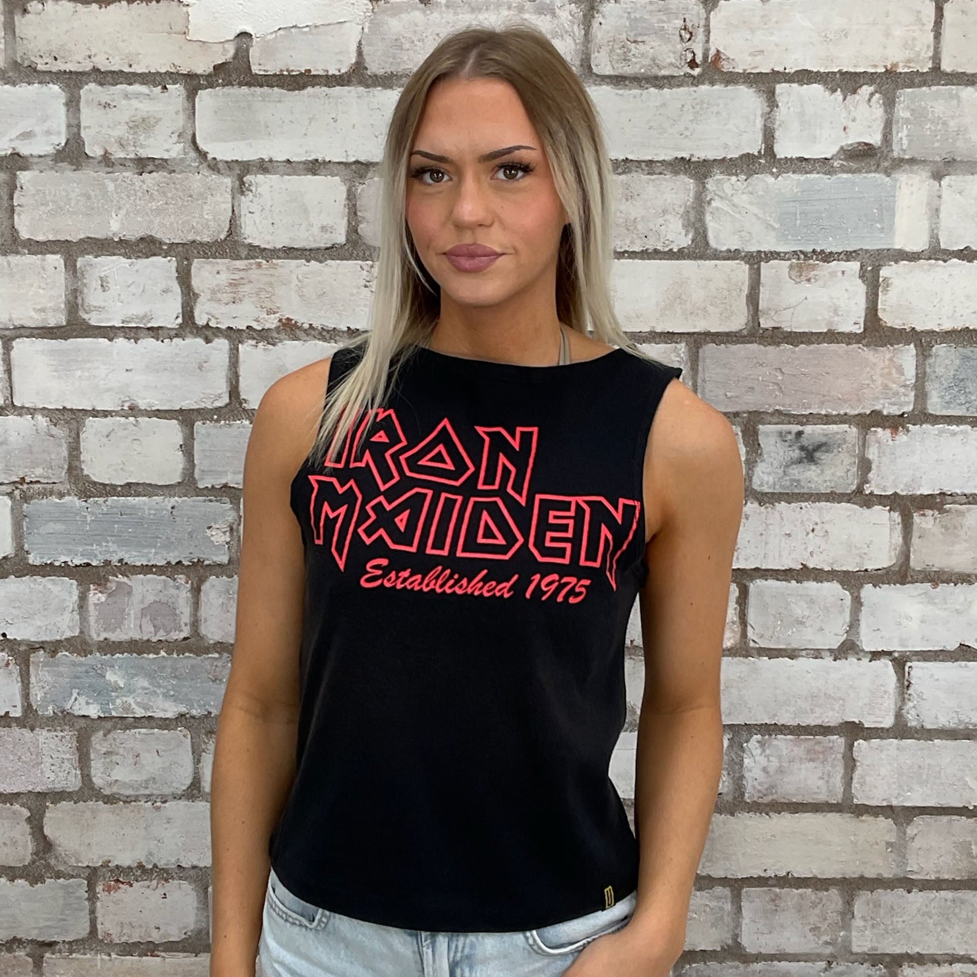 Iron Maiden Red Band Logo on black Slash neck tank top made from upcycled graphic band tshirt, punk rock style street wear, athleisure wear, unwantees is a sustainable fashion brand, we take unwanted graphic tshirts otherwise destined for landfill and recycle clothing into vest tops for sports wear or leisure.  Refashioned band merch, Slash Neck Sleeveless Top