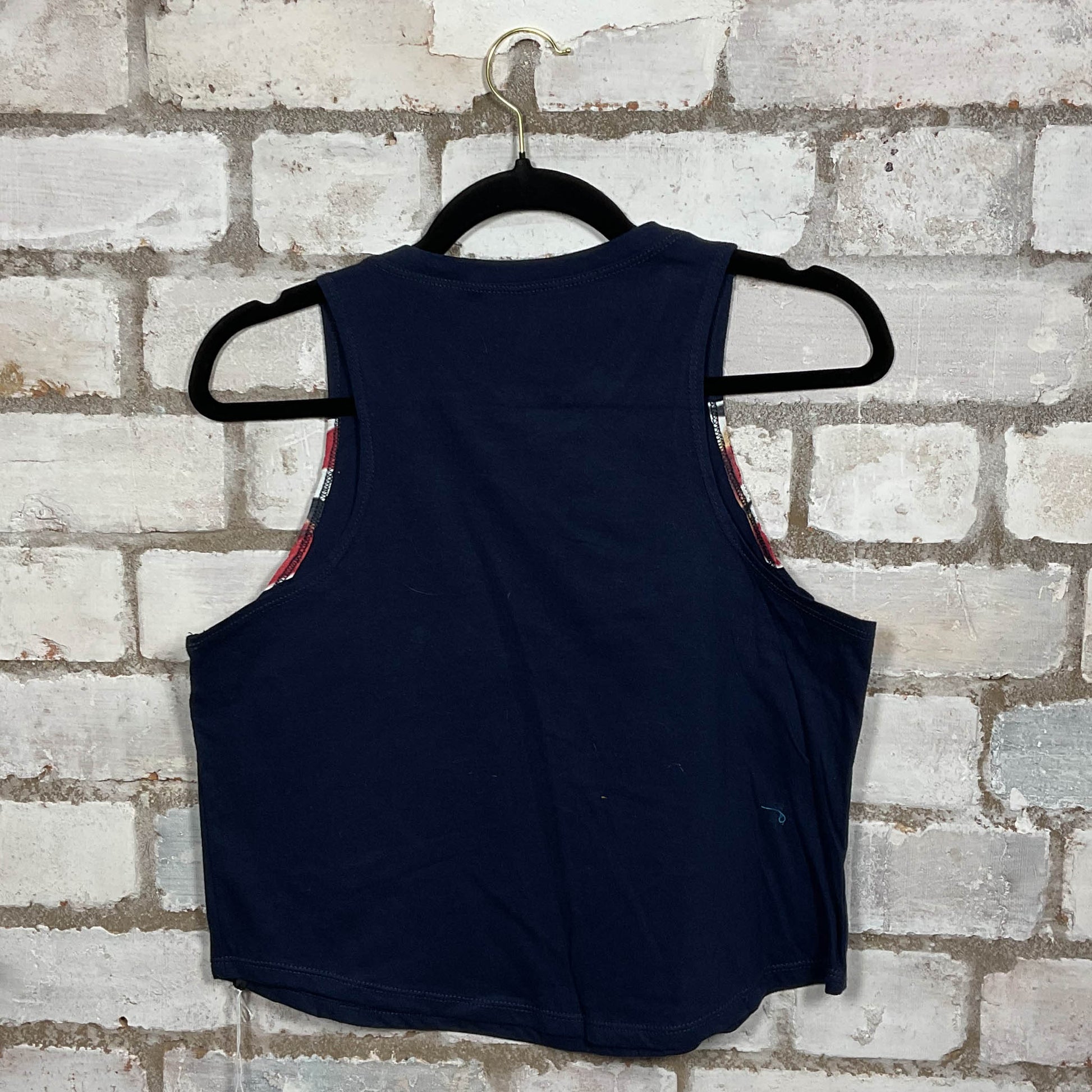 Rear view of OASIS Brit Pop Classic logo merch graphics on Navy cotton Racerback Tank Top upcycled by Unwantees, sustainable fashion made in Great Britain from vintage graphic tshirt 