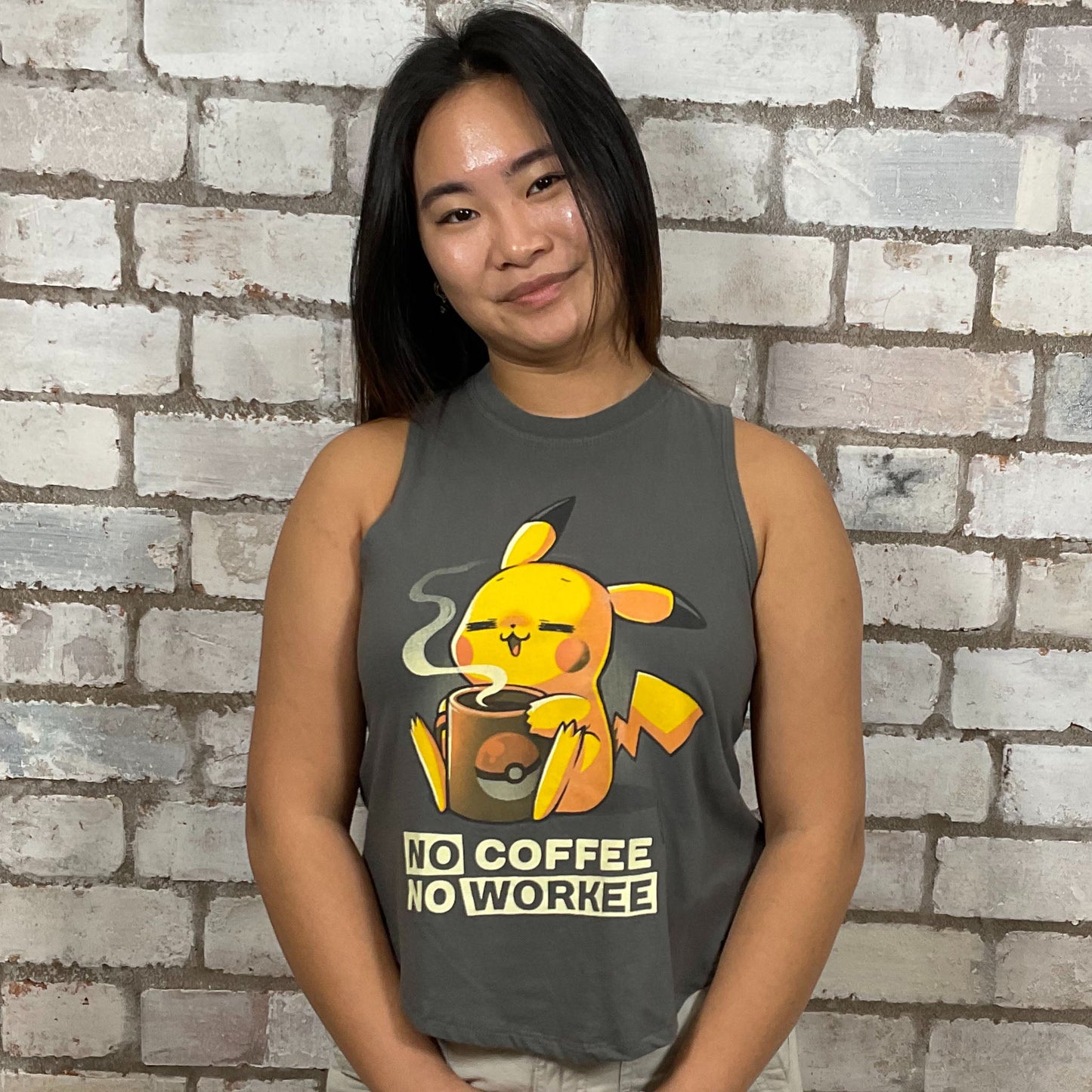 No Coffee No Workee Pokeman graphic print Unwantee made from upcycled and deconstructed graphic tshirt, punk rock style street wear, athleisure wear, unwantees is a sustainable fashion brand, we take unwanted graphic tshirts otherwise destined for landfill and recycle clothing into vest tops for sports wear or leisure.  Refashioned band merch, Slash Neck Sleeveless Top