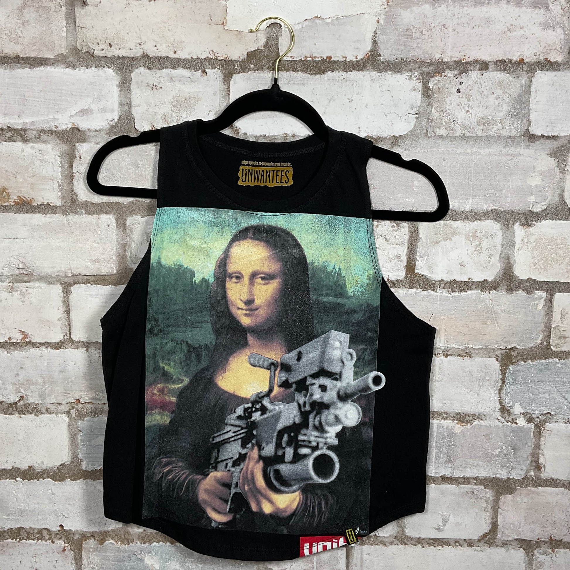 Machine gun toting Mona Lisa Illustration graphic on black cotton Racerback Tank Top upcycled by Unwantees, sustainable fashion made in Great Britain from vintage graphic tshirt 
