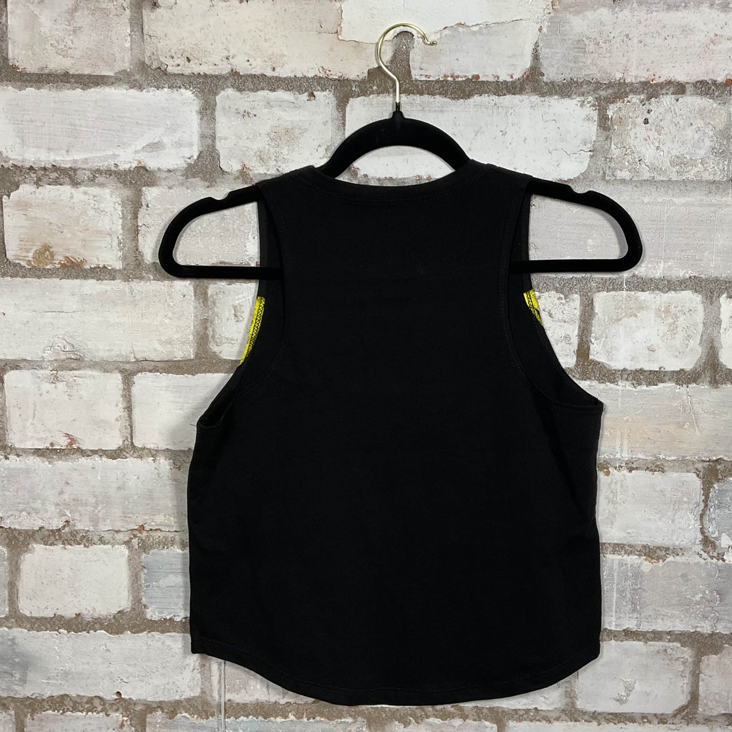Rear View of Classic Nirvana Yellow on Black Illustration yellow graphic on black cotton Racerback Tank Top upcycled by Unwantees, sustainable fashion made in Great Britain from vintage graphic tshirt 