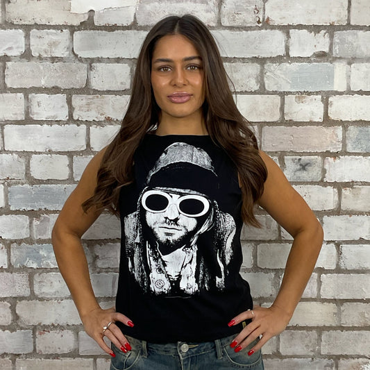 Kurt Cobain tshirt recycled into sleeveless vest top, sustainable upcycled fashion, British recycled grunge brand, slow fashion, eco conscious fashion graphic tshirt upcycled by Unwantees, recycled tshirt otherwise destined for landfill.  Nirvana Punk Rock music style graphic tshirt upcycled by Unwantees, Slash Neck tank top, upcycled in the UK by unwantees. Sustainable upcycled fashion