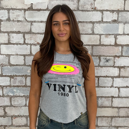 1980s themed graphic tshirt upcycled by Unwantees,  eco conscious fashion graphic tshirt upcycled by Unwantees, recycled tshirt otherwise destined for landfill.  Graphic tshirt recycled into sleeveless vest top, sustainable upcycled fashion, British recycled acid house print slow fashion, Punk Rock music style graphic tshirt upcycled by Unwantees, Racerback tank top, upcycled in the UK by unwantees. Sustainable upcycled fashion