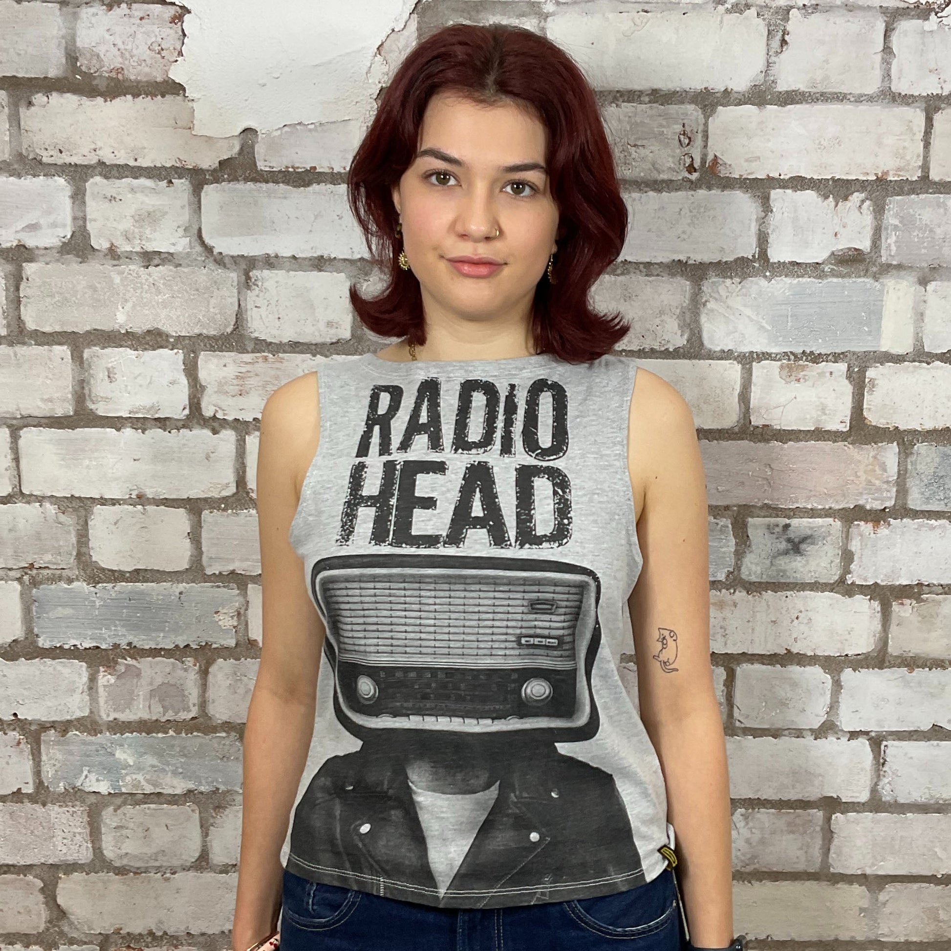 Radiohead classic band logo graphic print ion 100% cotton fabric, black on grey, Unwantee made from upcycled and deconstructed graphic tshirt, punk rock style street wear, athleisure wear, unwantees is a sustainable fashion brand, we take unwanted graphic tshirts otherwise destined for landfill and recycle clothing into vest tops for sports wear or leisure.  Refashioned band merch, Slash Neck Sleeveless Top