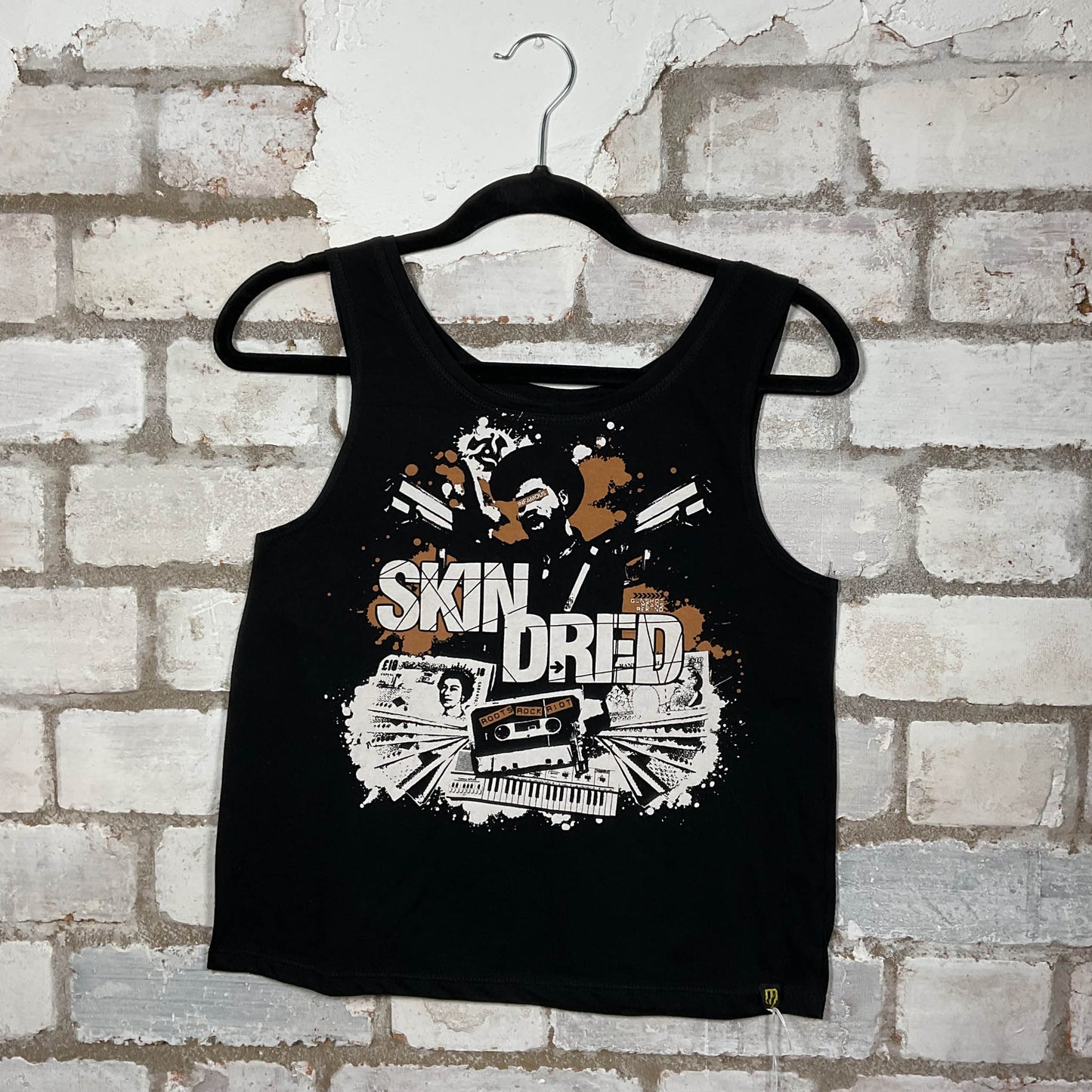 Skindred band graphics on a black cotton Scoop Neck Tank Top upcycled by Unwantees, sustainable fashion made in Great Britain from vintage graphic tshirt 