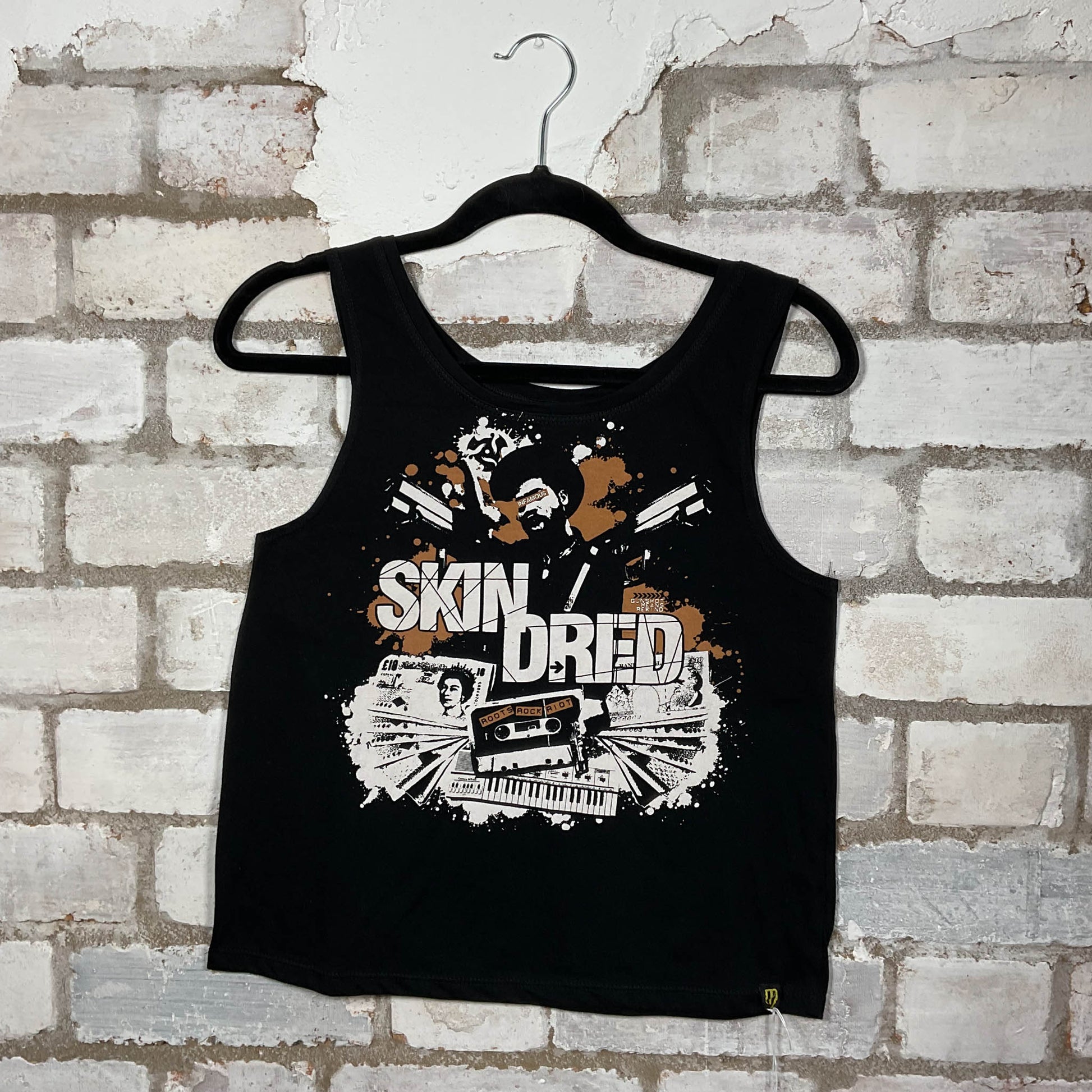 Skindred band graphics on a black cotton Scoop Neck Tank Top upcycled by Unwantees, sustainable fashion made in Great Britain from vintage graphic tshirt 