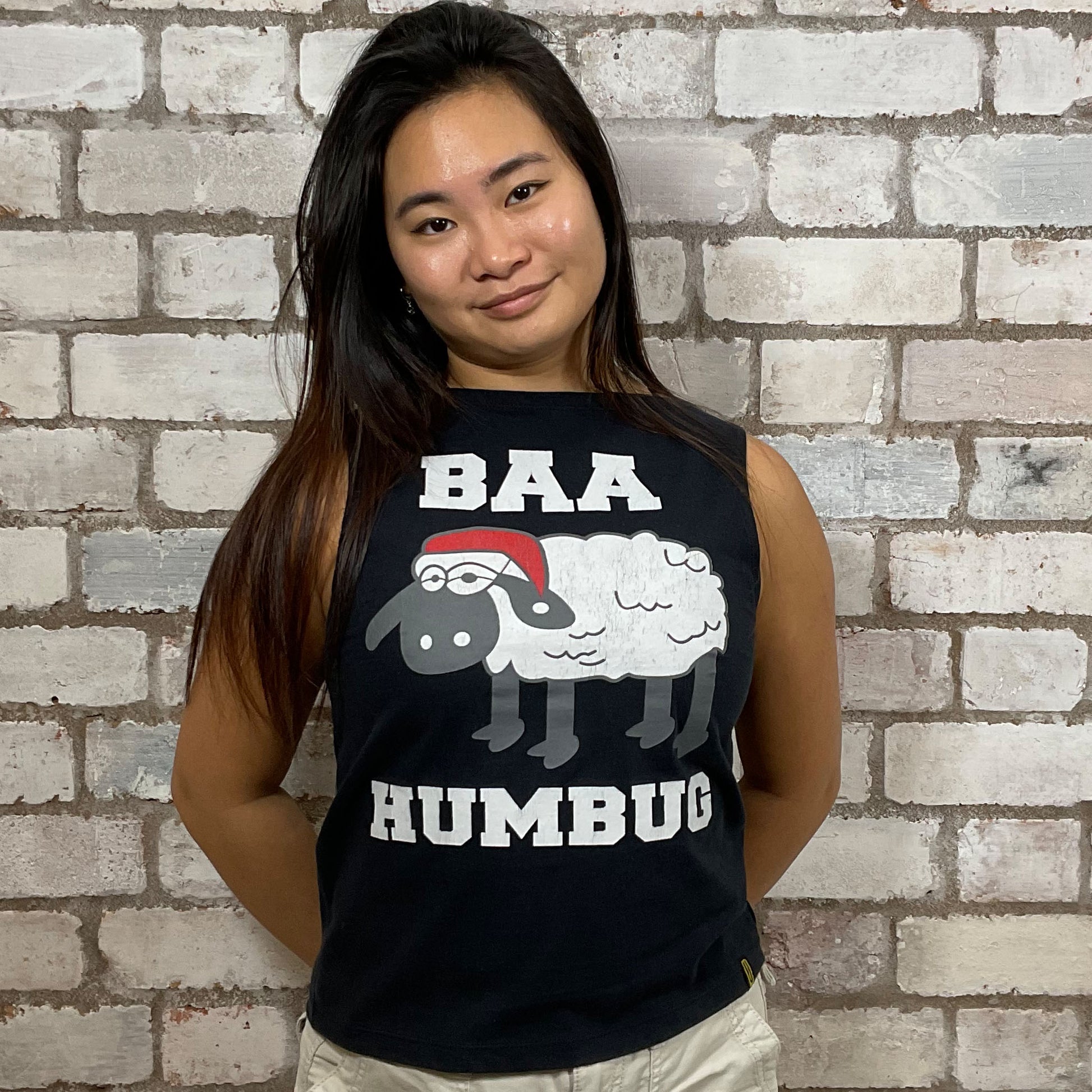 Christmas tank top made from upcycled Christmas graphic print tshirt.  An upcycle by uNwantees. Made in the UK, Sustainable fashion, eco conscious shopping