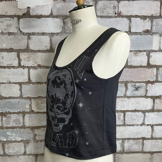 Black tank top with skull design on a mannequin against a brick wall.  Grateful Dead Tank top. Vest Top, Faded Grey Tank, sleeveless top
