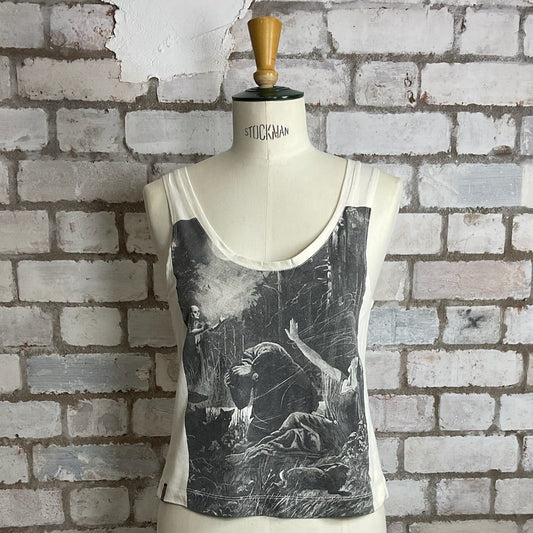 Mannequin wearing a tank top with graphic design against a brick wall.  Lord Huron band tshirt upcycled by Unwantees, recycled Lord Huron band top into vest top, slow fashion, sustainable fashion UK eco-friendly clothing UK upcycled t-shirts / upcycled tank tops ethical fashion brand UK zero waste clothing slow fash