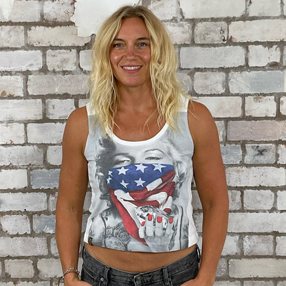 Woman wearing a tank top with a graphic design in front of a brick wall.  Athleisure wear,  Marilyn Munroe tank top, Diamonds are a girls best friend, unwanee, tank top, vest top, street wear, yoga top, Sports top, USA flag