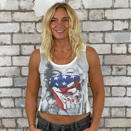 Woman wearing a tank top with a graphic design in front of a brick wall.  Athleisure wear,  Marilyn Munroe tank top, Diamonds are a girls best friend, unwanee, tank top, vest top, street wear, yoga top, Sports top, USA flag