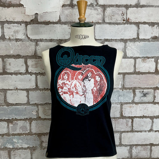Black sleeveless shirt with Queen graphic design on a mannequin against a brick wall, Queen Tank Top, Vintage Queen Print Vest, Unwantees Upcycle 