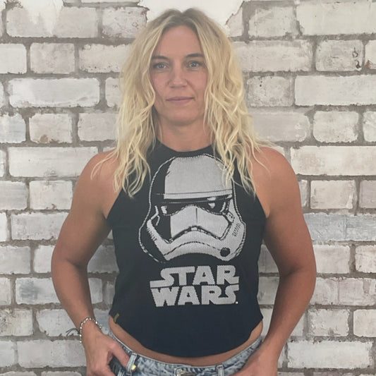 Person wearing a Star Wars tank top in front of a brick wall, 
sustainable fashion UK
eco-friendly clothing UK
upcycled t-shirts / upcycled tank tops
ethical fashion brand UK
zero waste clothing
slow fashion brand
made in Britain clothing
sustainable vest tops